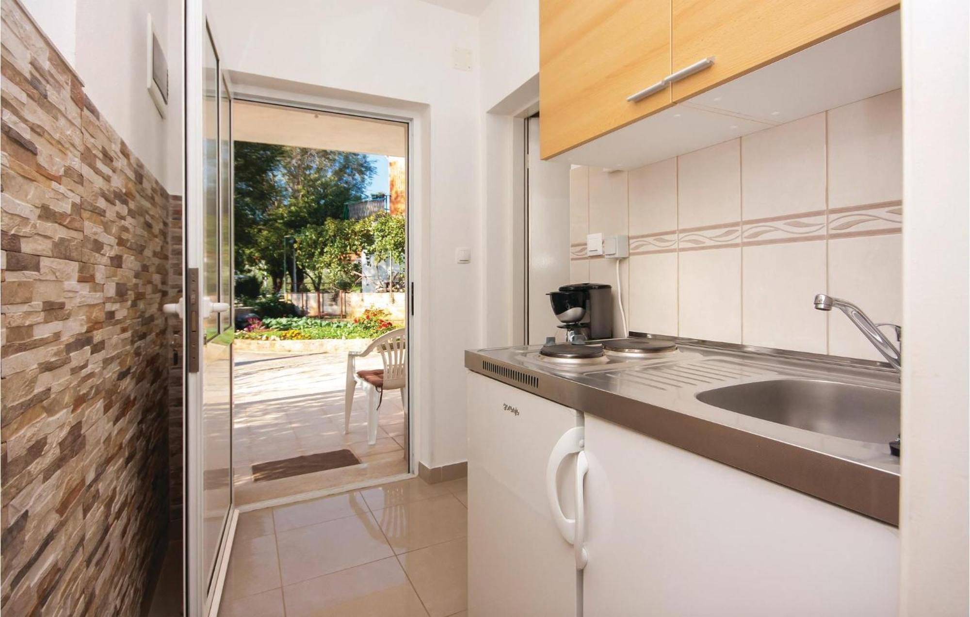 Nice Apartment In Raslina With House Sea View ภายนอก รูปภาพ